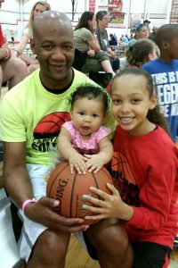 Mentoring Positives Executive Director Will Green with daughters