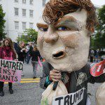 Anti-Trump protester demonstrates outside RNC headquarters in Washington