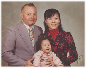 A baby Renee Moe with her American father and her Chinese mother who hails from Taipei, Taiwan.
