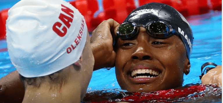 Swimming Upstream: Gold Medalist Becomes Inspiration