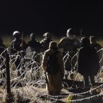 Protesters stand off with police during a protest against plans to pass the Dakota Access pipeline near the Standing Rock Indian Reservation, near Cannon Ball, North Dakota, U.S.