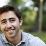 Close-up of a young man smiling