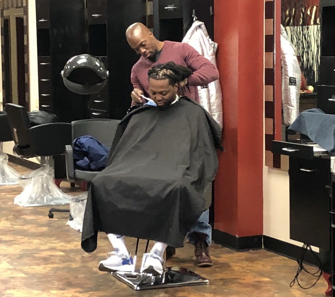 Organization teams with local barber shops to provide free back-to