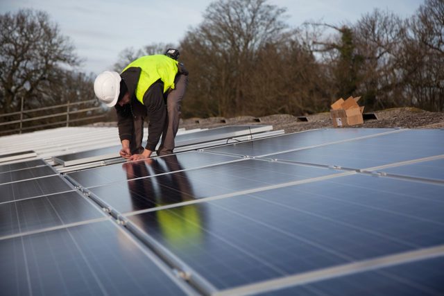 1280px-Solar_panel_installation_at_Grange_farm