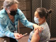 Hmong community leaders, Public Health partner to host vaccinations clinics at Hmong grocery stores in September