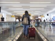 Fully vaccinated people can resume travel at low risk to themselves, new CDC guidance says