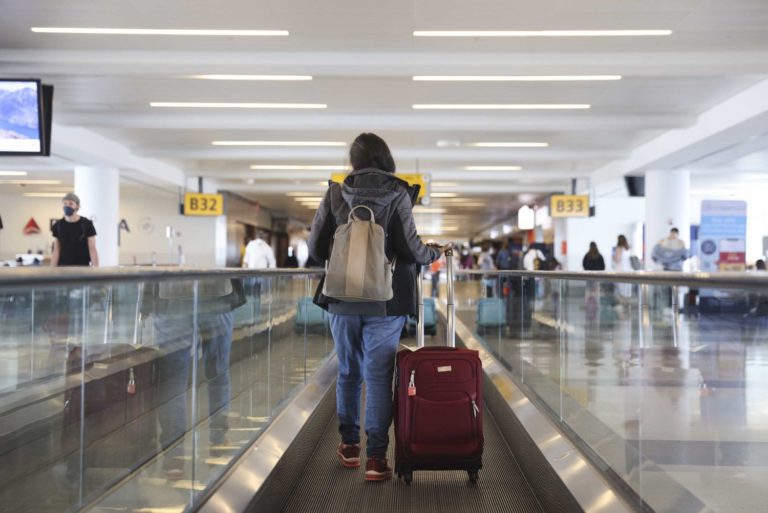 Fully vaccinated people can resume travel at low risk to themselves, new CDC guidance says