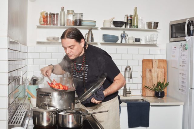 Sean Sherman, the founder of The Sioux Chef, a company devoted to Indigenous foods, cooks in New York, Oct. 28, 2019. Food Stylist: Maggie Ruggiero. Prop Stylist: Paige Hicks. (Marcus Nilsson/The New York Times)