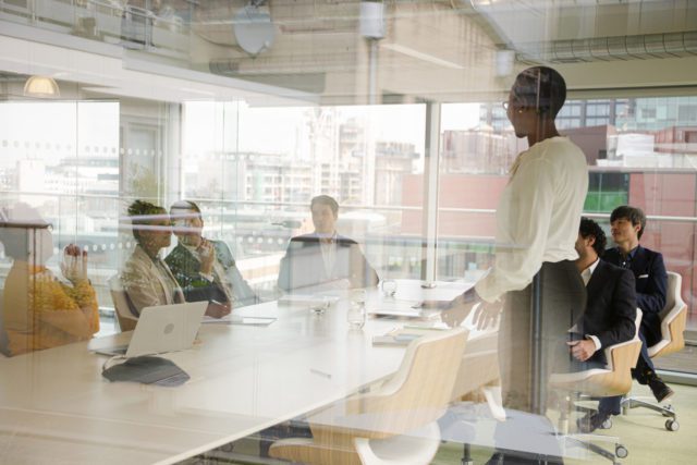 Business people in conference room meeting