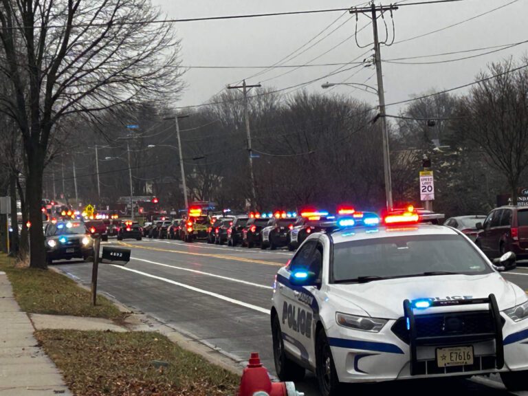 A second-grader was the first to call 911 as another student opened fire at Abundant Life Christian School, killing 2 and injuring 6