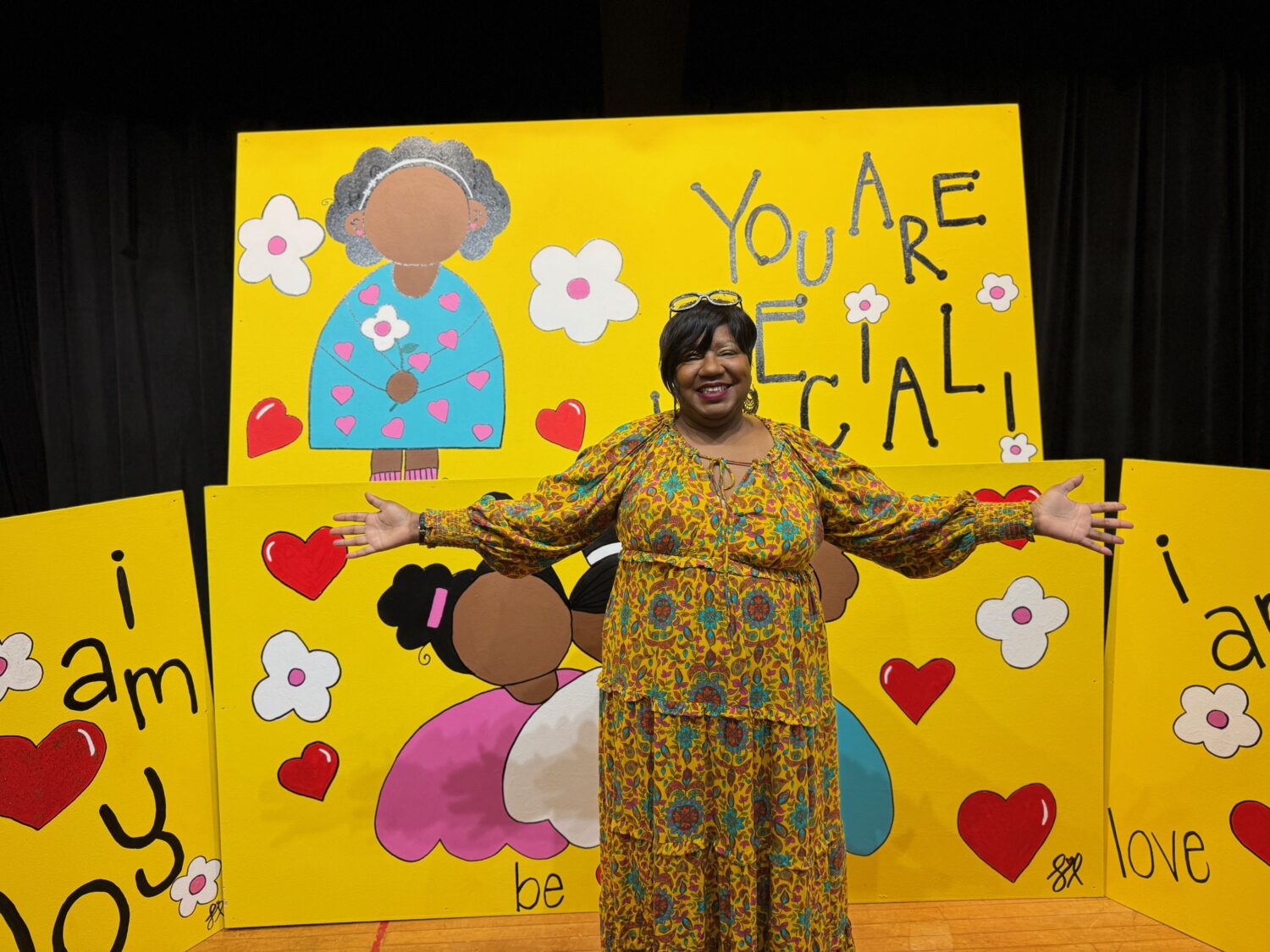 Artist Lilada Gee unveils her mural artwork at Lapham Elementary School, 55 years after attending kindergarten there