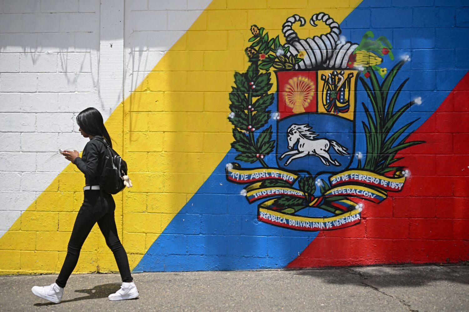 As US tensions rise, Venezuelans keep calm and carry on – but whisper hopes of change As US tensions rise, Venezuelans keep calm and carry on – but whisper hopes of change