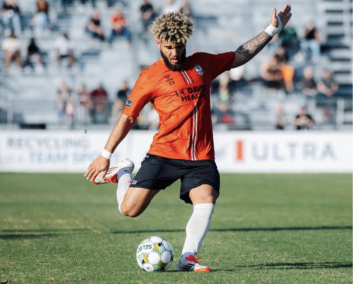 Forward Madison signs defender AJ Edwards