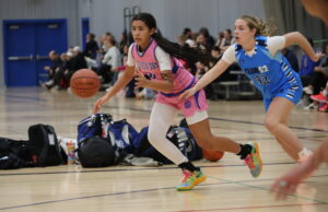 Playing a year up, Madison365 girls basketball dominates Midwest Madness