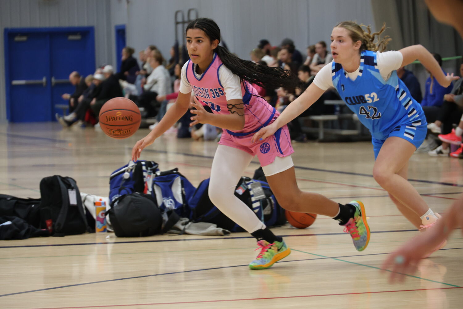 Playing a year up, Madison365 girls basketball dominates Midwest Madness