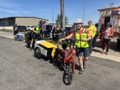 “Pedaling with a purpose.” Meals on 2 Wheels celebrates launch of e-bike grocery delivery service