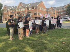 ICE agent points gun at Virginia woman who shouted at them in video that conflicts with government’s narrative