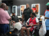 Inside a Philadelphia barbershop, Black men debate their political past and future